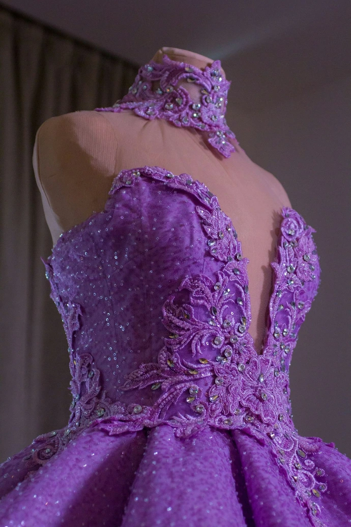 a purple dress with a diamond